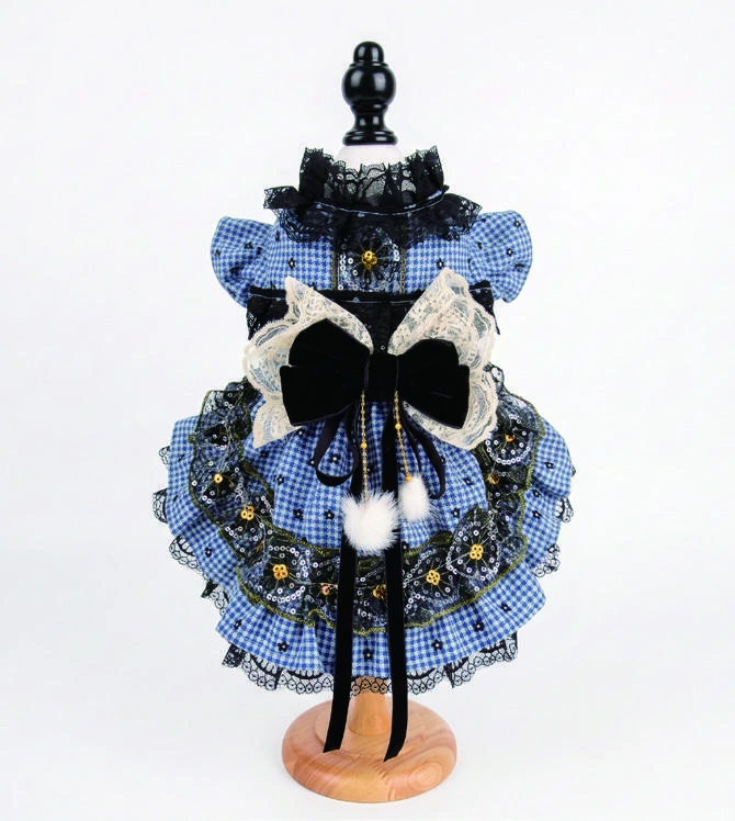 Catalog photograph of blue & black bow dress