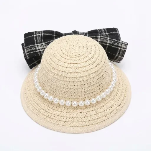Pale hat with a black plaid bow and white round beads